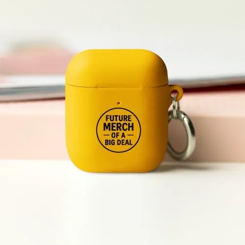 A yellow Airpods case with black text that says Future Merch of a Big Deal representing tech accessory promotional products available in our store for same-day online ordering in Las Vegas .